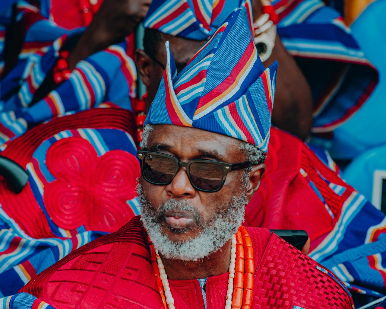 portfolio-06 A striking portrait highlighting traditional Nigerian attire with vivid colors and cultural significance.